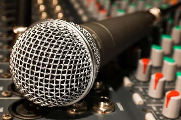 Microphone lying on sound equipment