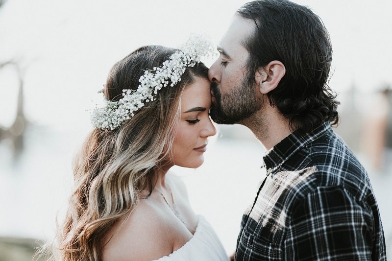 Bride and groom kiss